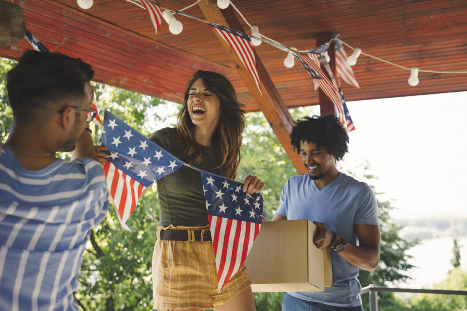 friends decorate for Fourth of July party