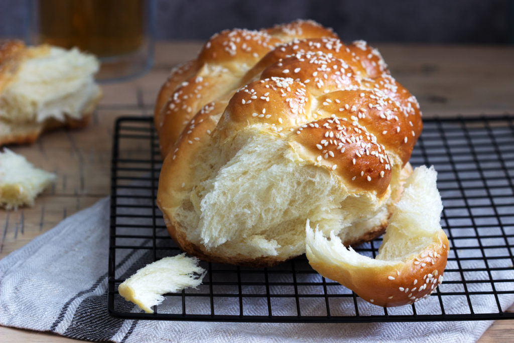 Traditional festive challah bread made from yeast dough with eggs.