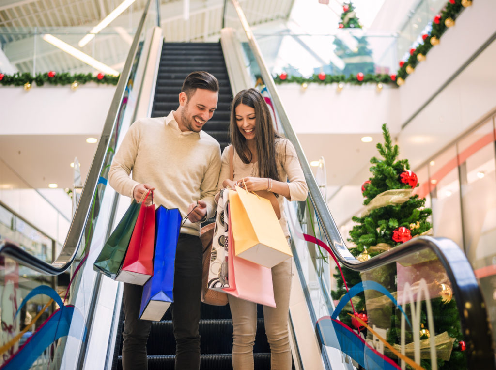 Couple doing Christmas shopping.